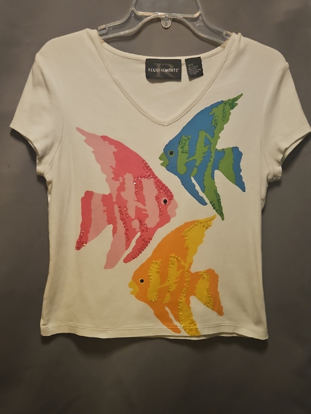 Requirements White Tee with Pink, Blue, Green & Yellow Sequenced Fish